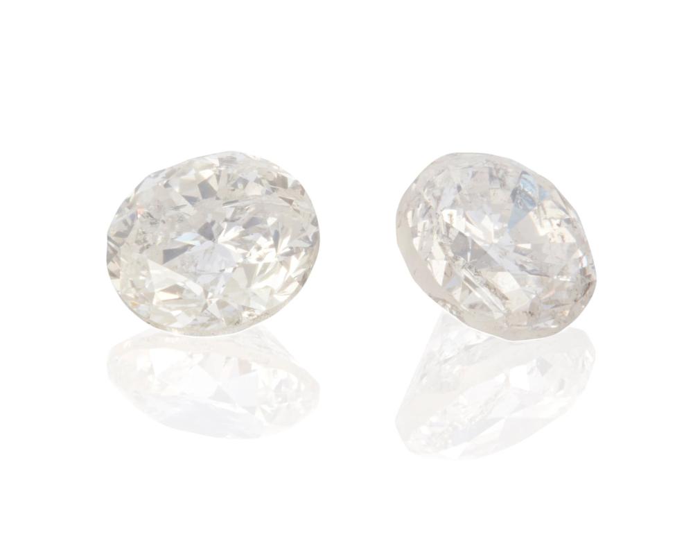 Appraisal: TWO UNMOUNTED DIAMONDSTwo unmounted diamonds Including two round mixed-cut diamonds