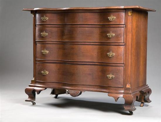 Appraisal: CHIPPENDALE-STYLE SERPENTINE-FRONT CHEST OF DRAWERS In the New England style