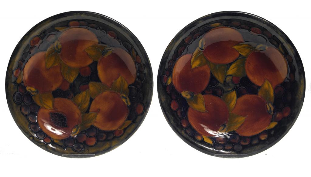 Appraisal: TWO MOORCROFT POMEGRANATE DISHES DESIGNED BY WILLIAM MOORCROFT cm diam