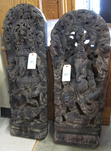 Appraisal: TWO EAST INDIAN WOOD SCULPTURES Ganesha the elephant god the