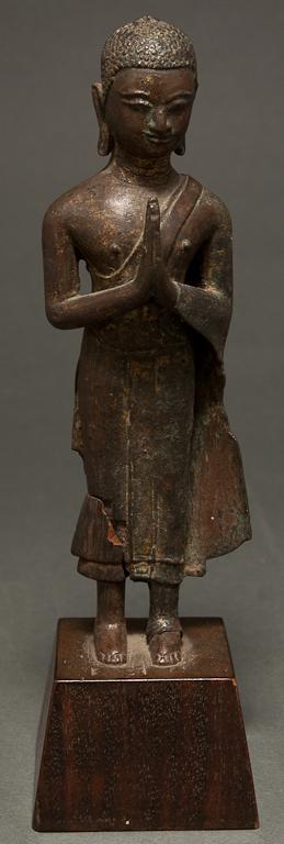 Appraisal: Thai copper figure of the Buddha standing th century with