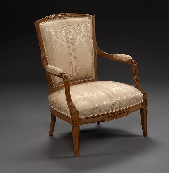 Appraisal: A Louis XVI style fruitwood armchair second quarter th century