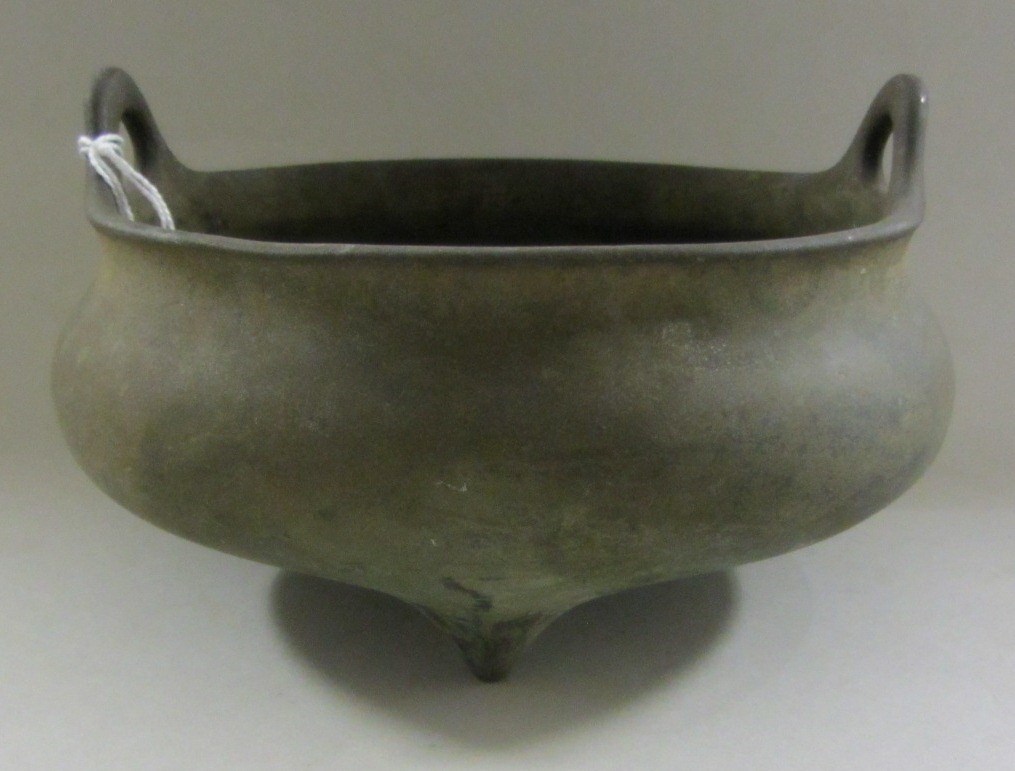 Appraisal: A Chinese bronze tripod censer Xuande six character mark but