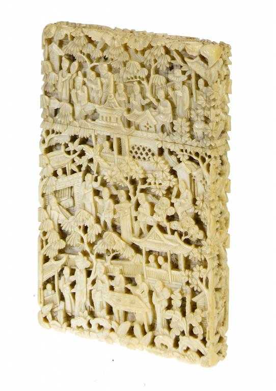 Appraisal: A CHINESE EXPORT IVORY CARD CASE AND COVER intricately carved