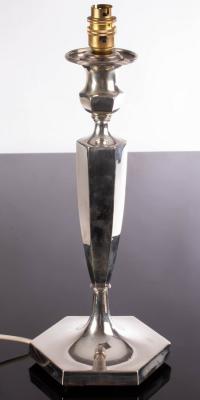 Appraisal: A silver candlestick Sheffield converted as a table lamp with