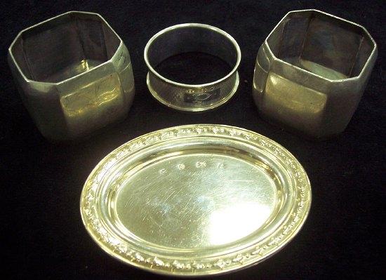 Appraisal: A napkin ring circular with engine turned decoration B Co