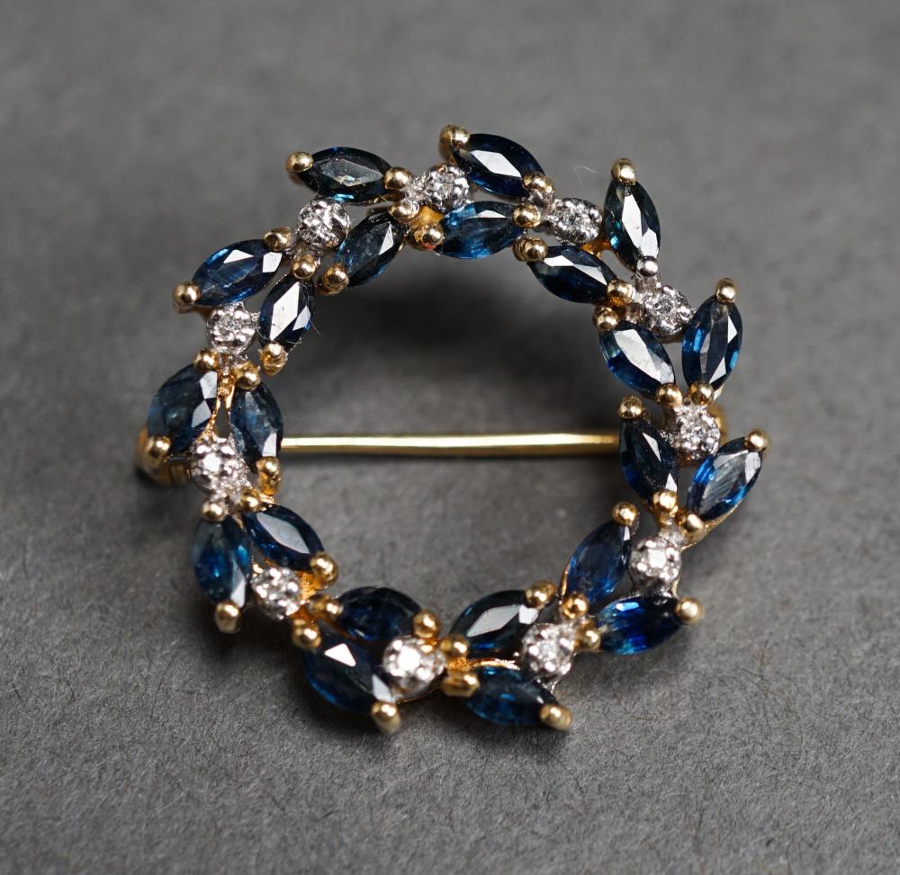 Appraisal: Tested -Karat Yellow-Gold Blue Sapphire and Diamond 'Wreath' Brooch gross