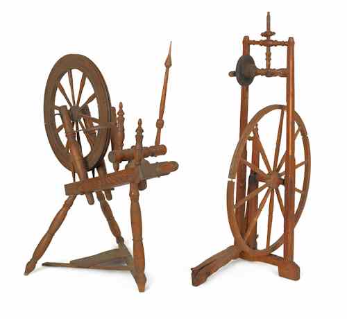 Appraisal: Two spinning wheels th c together with a wool winder