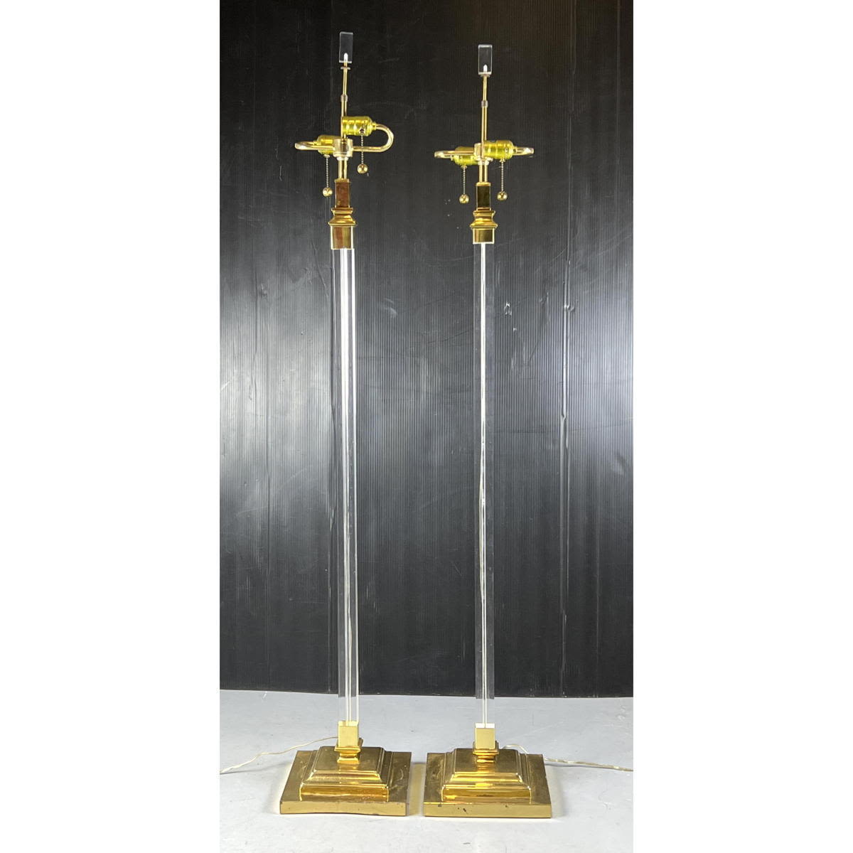 Appraisal: Pair decorator Brass and Lucite Floor Lamps Classical design Dimensions