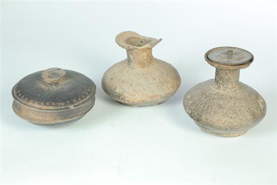 Appraisal: THREE POTTERY VESSELS China Early earthenware pieces with tooled designs