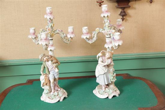 Appraisal: PAIR OF FIGURAL CANDELABRA Bisque candelabra with highly detailed floral