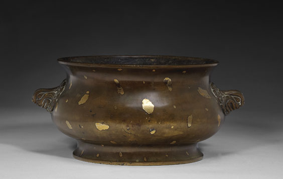 Appraisal: LARGE GOLD-SPLASHED BRONZE CENSER Large and antique Chinese bronze censer