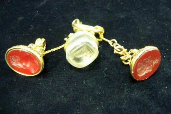 Appraisal: A Regency pierced gold seal set a cornelian with die