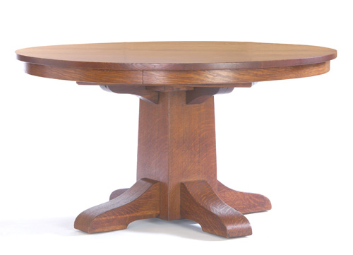 Appraisal: GUSTAV STICKLEY Pedestal dining table with two leaves Original finish