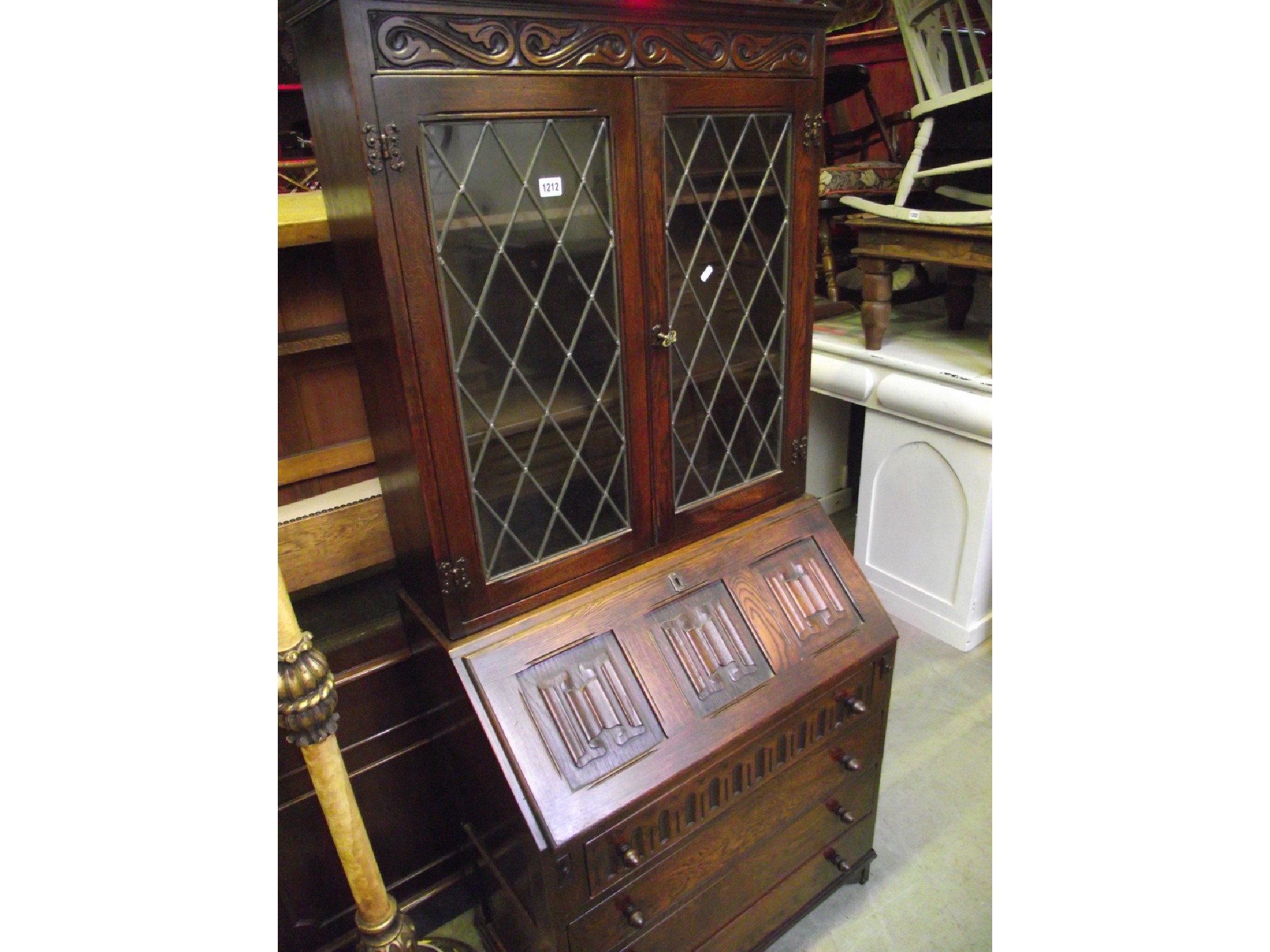 Appraisal: A reproduction oak bureau bookcase probably Jaycee or Old Charm