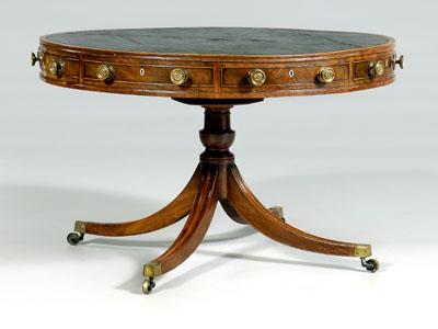 Appraisal: Regency mahogany drum table probably original green leather top skirt