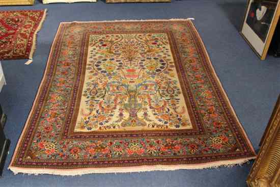 Appraisal: A Kashan rug with vase of flowers and birds amongst