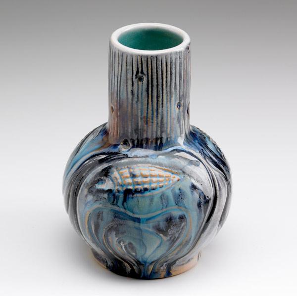 Appraisal: NORTH DAKOTA SCHOOL OF MINES Bottle-shaped vase with fish and