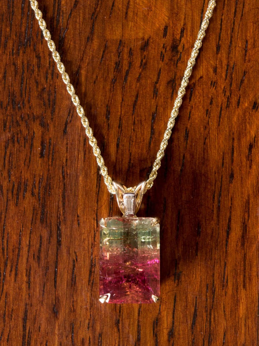 Appraisal: TOURMALINE AND FOURTEEN KARAT GOLD PENDANT NECKLACE with a k