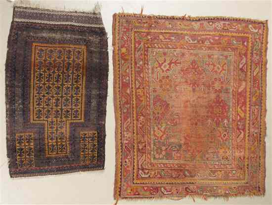 Appraisal: Two Persian Wool Rugs each with geometric decoration within multiple