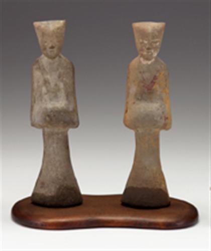 Appraisal: Two Chinese grey pottery burial figures of female attendants han