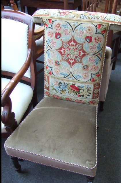 Appraisal: A needlework prie dieux chair raised on rosewood turned supports