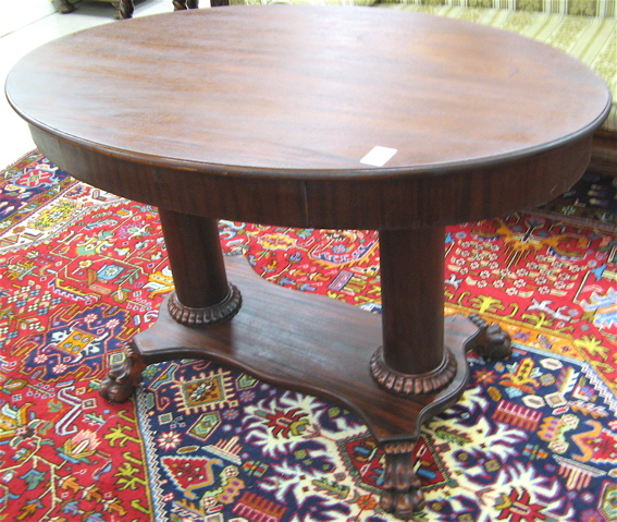 Appraisal: EMPIRE REVIVAL MAHOGANY CENTER TABLE American c having an oval