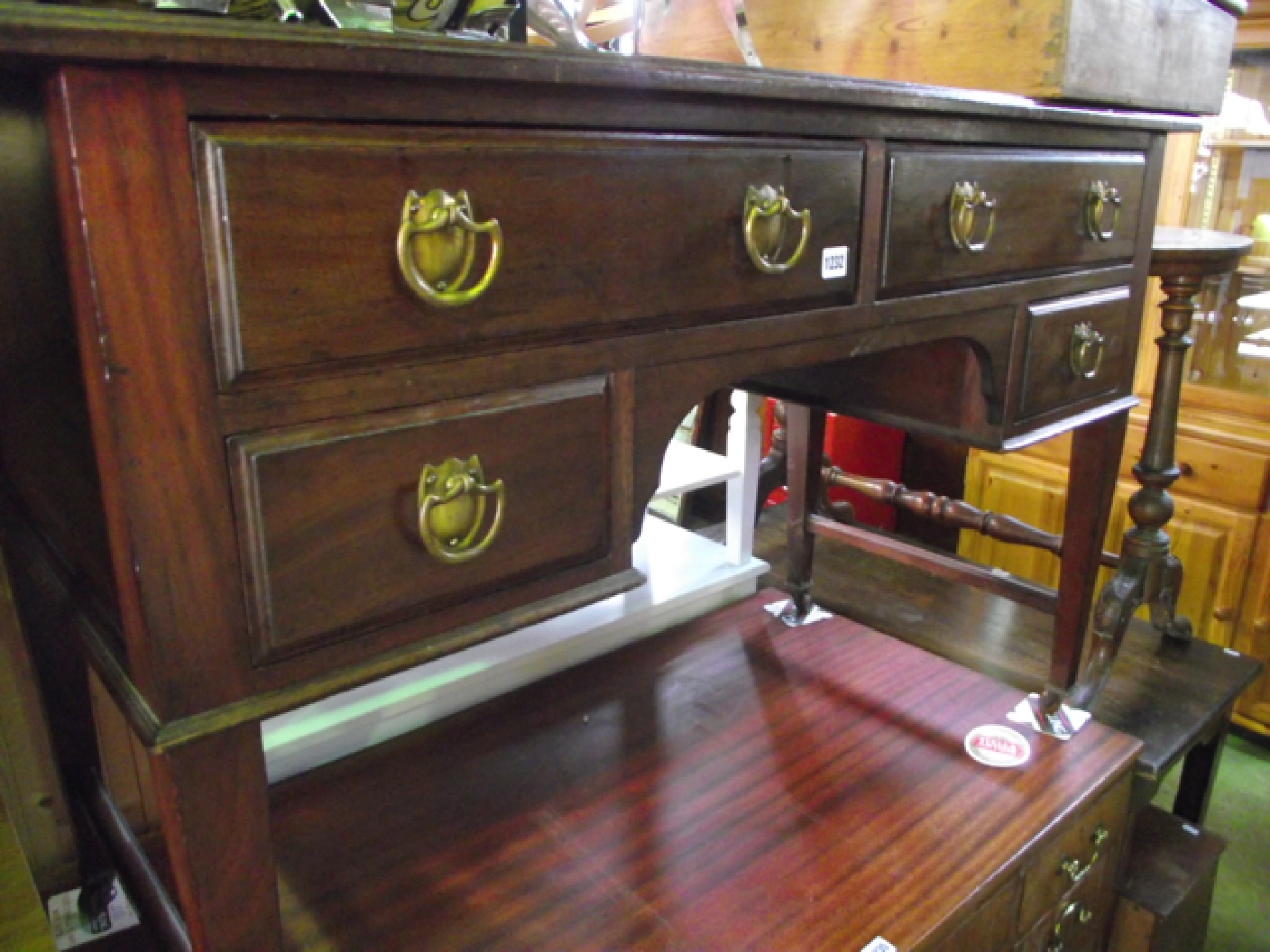 Appraisal: An Art Nouveau mahogany desk or side table fitted with