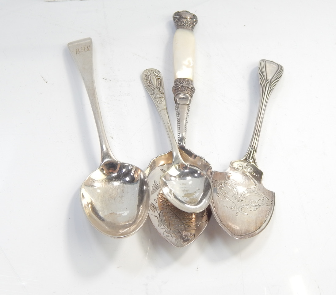 Appraisal: Two silver slicers and two silver spoons total weight oz