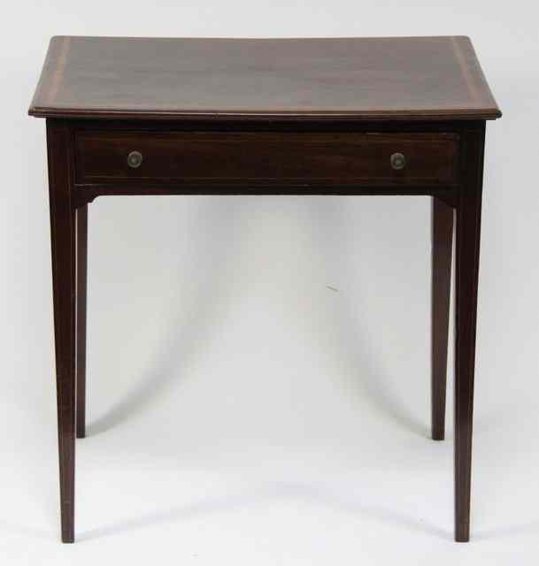 Appraisal: An Edwardian side table fitted a single drawer on taper