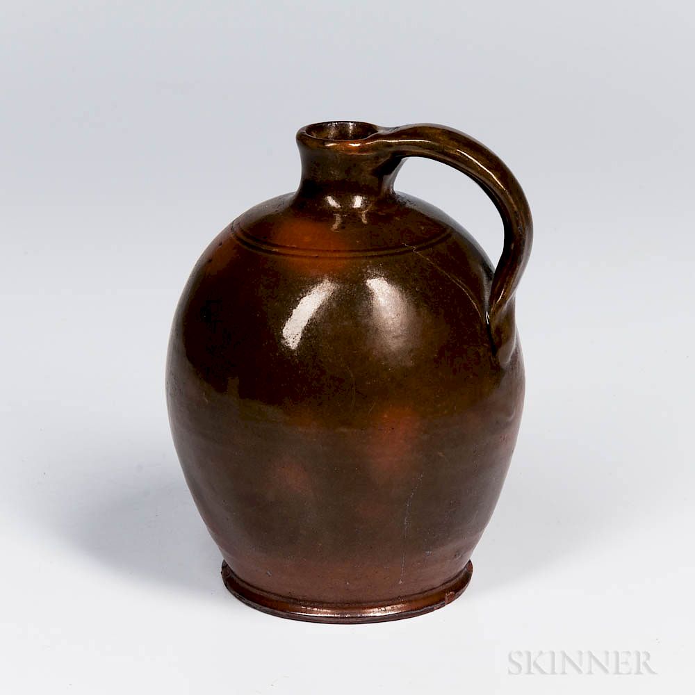 Appraisal: Mottled Green- and Orange-glazed Redware Jug Mottled Green- and Orange-glazed