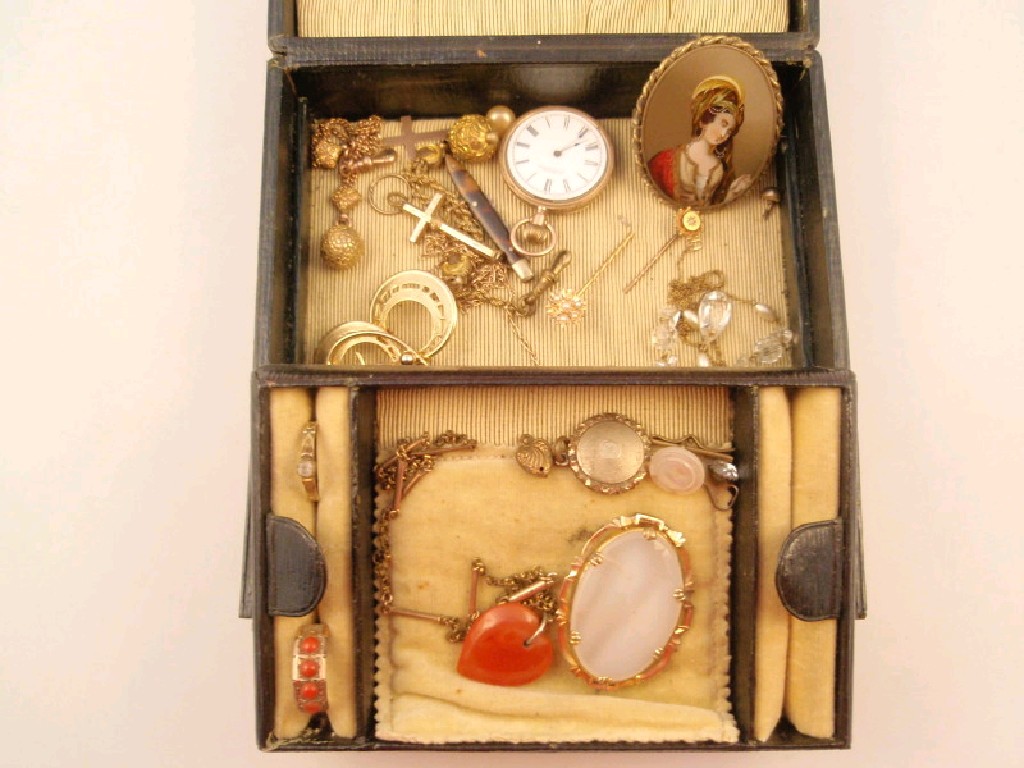 Appraisal: A small jewellery box and contents to include two stick