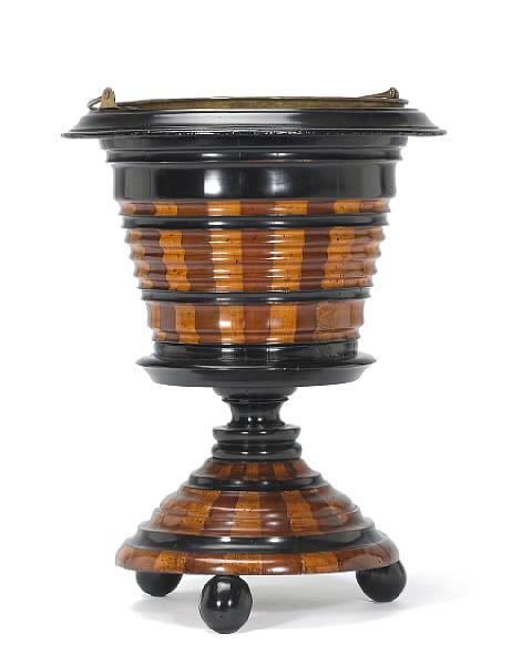 Appraisal: A Dutch walnut satinwood and parcel ebonized jardiniere second half