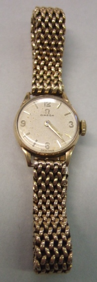 Appraisal: A ladies ct gold circular cased Omega wristwatch on a