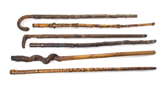 Appraisal: Sale Lot Six Carved Wood Walking Sticks each carved to