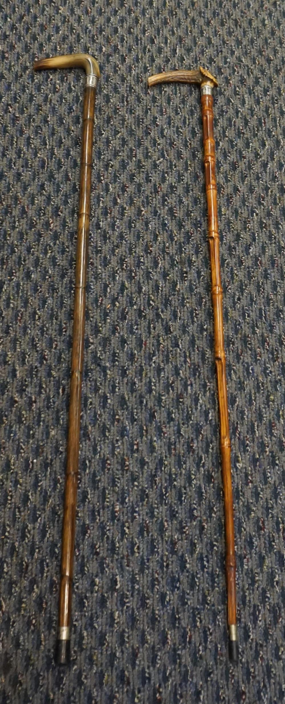 Appraisal: Two Sterling Silver Mounted Canes