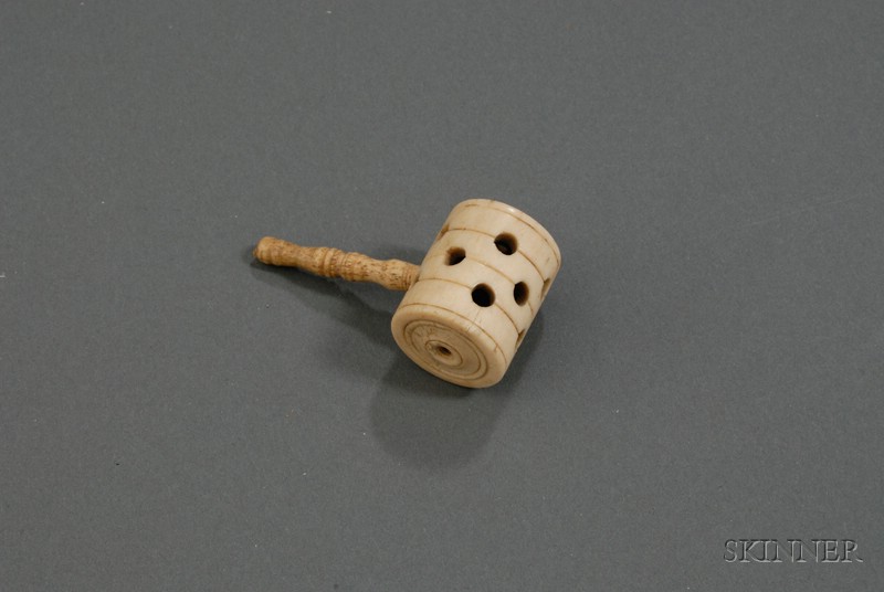 Appraisal: Carved and Pierced Child's Whalebone Rattle late th century carved