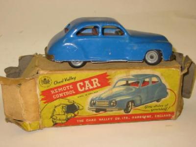 Appraisal: A Chad Valley remote control car clockwork operated bulb and