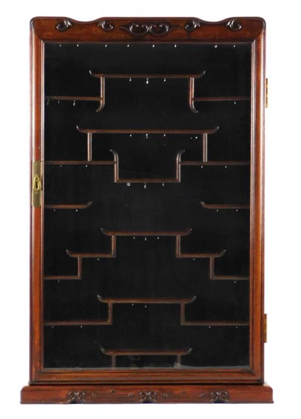 Appraisal: ASIAN Wall display cabinet carved frame temple form shelving glass