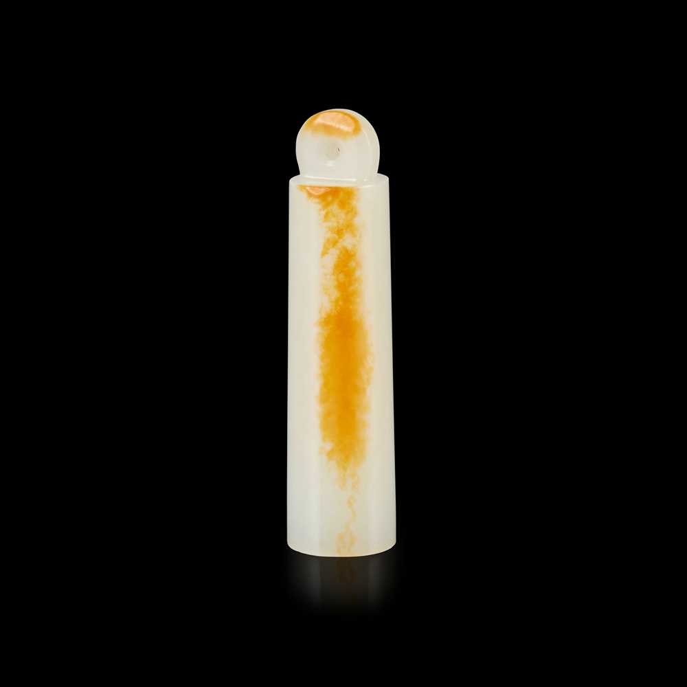 Appraisal: WHITE JADE WITH RUSSET SKIN HAT PENDANT of tapering cylindrical