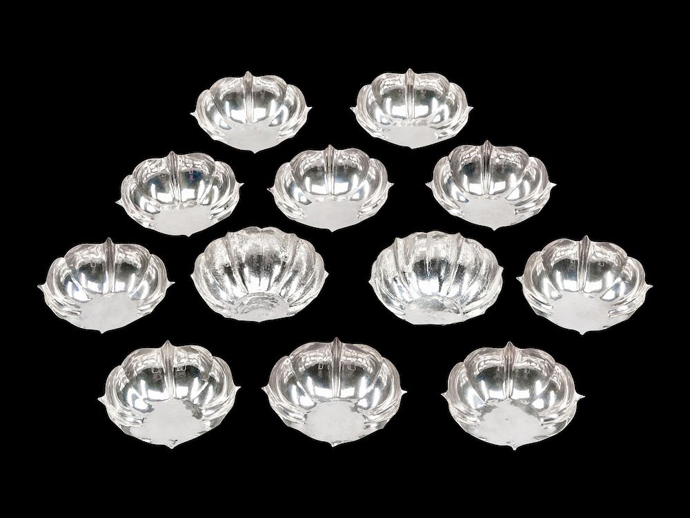 Appraisal: Twelve Silver Bowls Twelve Silver Bowls Likely Southeast Asian th