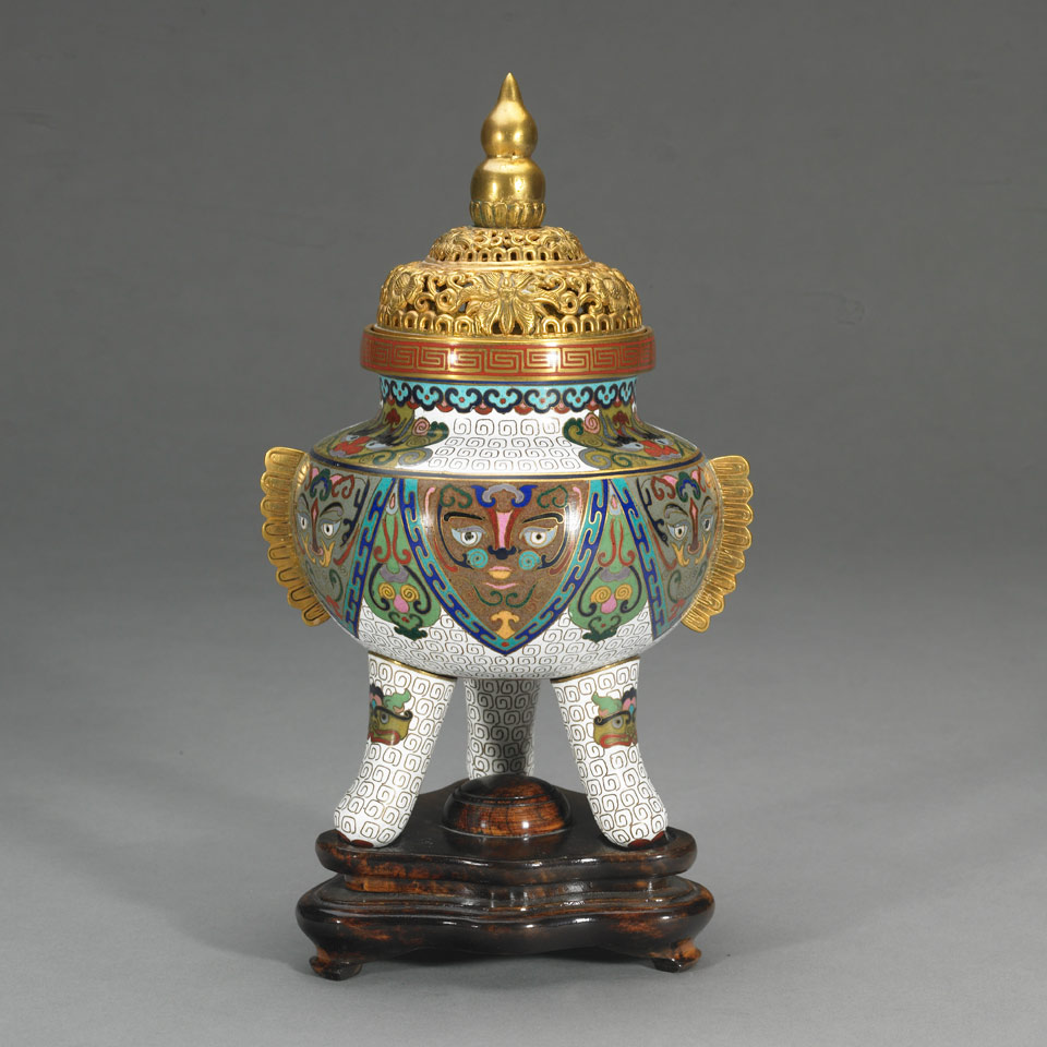 Appraisal: White Ground Cloisonn Enamel Tripod Censer Ding With archaistic design