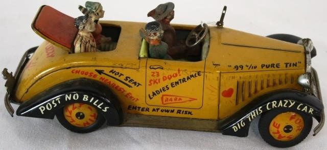 Appraisal: ARNOLD TIN LIZZIE TIN LITHOGRAPH WIND-UP TOY COMPOSITION FIGURES GOOD