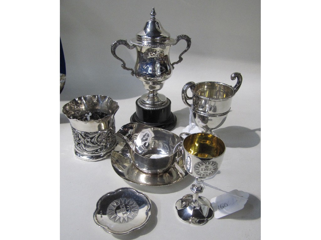 Appraisal: Two silver trophy cups a silver communion cup on stand