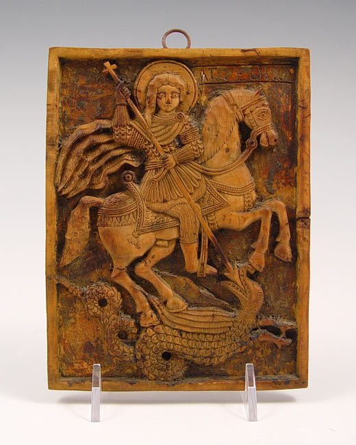 Appraisal: EARLY TH CARVED WOOD ST GEORGE THE DRAGON Relief carved