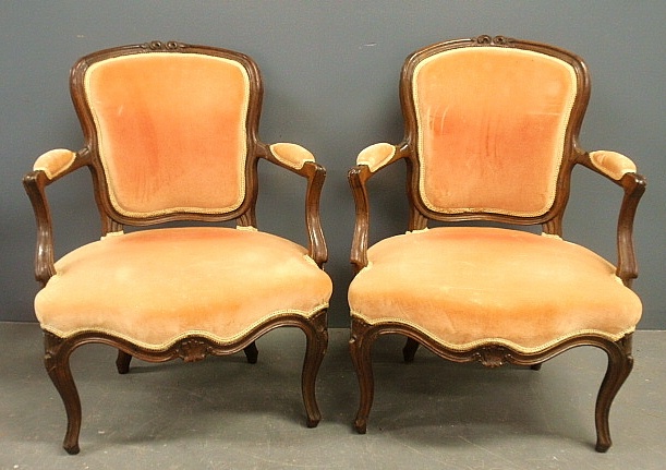 Appraisal: - Pair of French carved walnut fauteuils c h x