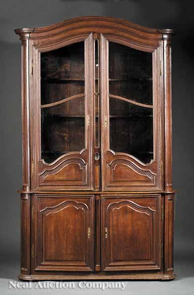 Appraisal: A Louis XVI Carved Oak Apothecary Cabinet late th c