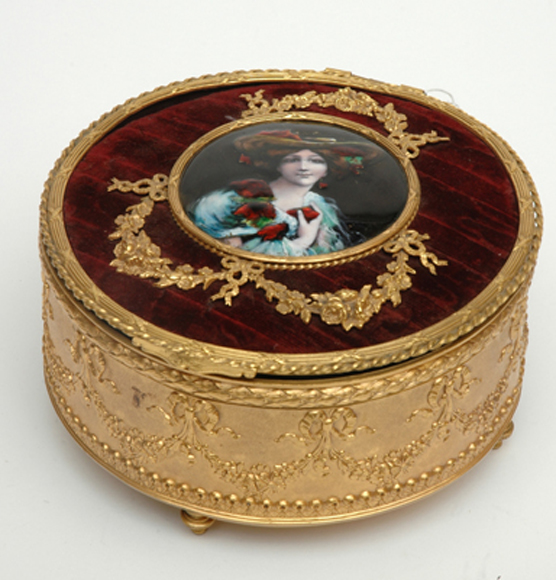 Appraisal: A FRENCH LIMOGES ENAMEL INSET GILT METAL MUSICAL JEWELLERY BOX