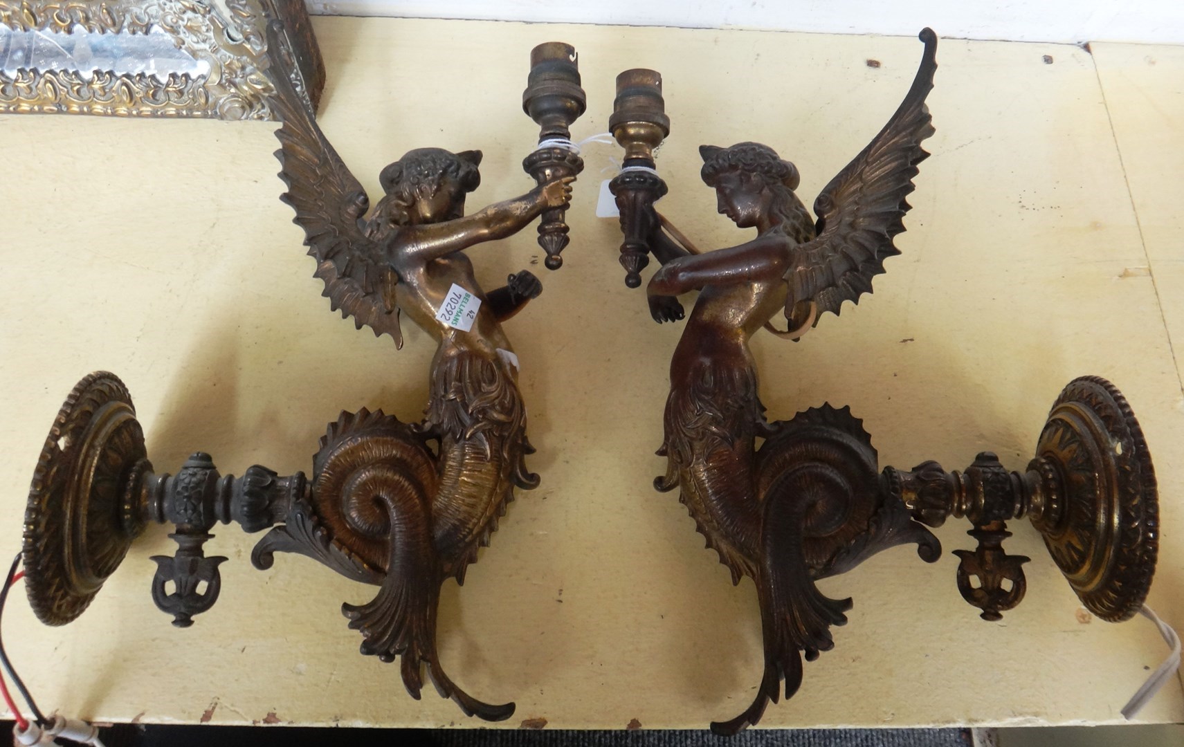 Appraisal: A pair of Victorian gilt metal single arm wall lights