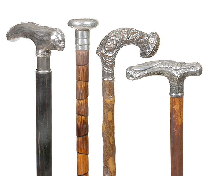 Appraisal: Four Silver Canes A group of four silver canes of